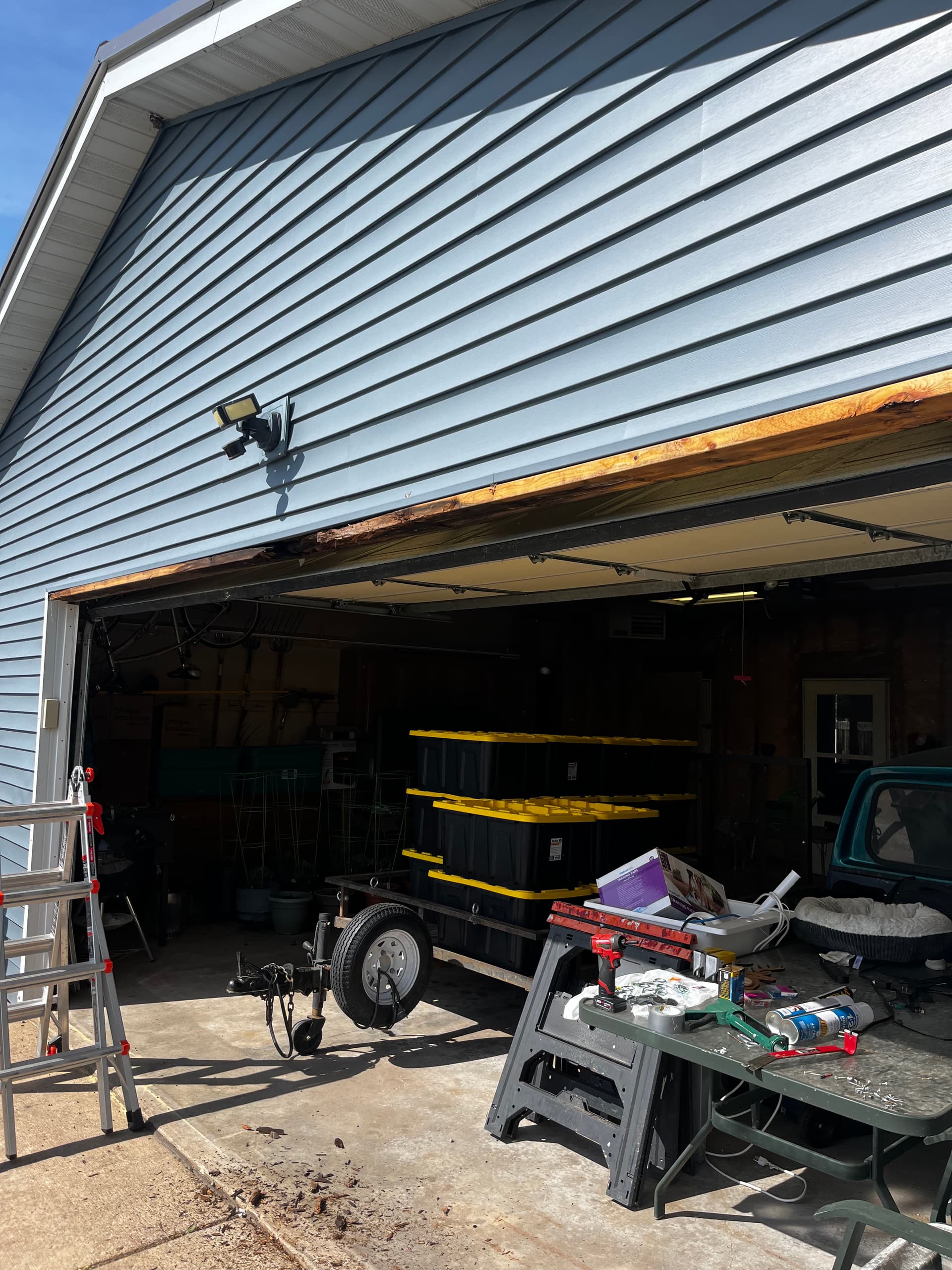 Garage Fascia Rot and Wind-Damaged Siding Fixed Right image